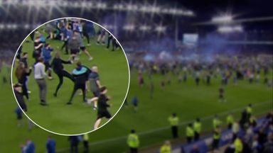 Vieira clashes with fan during Everton pitch invasion
