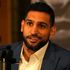 Amir Khan has announced he is &#34;hanging up his gloves&#34;