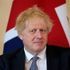 British Prime Minister Boris Johnson listens to the Amir of Qatar Sheikh Tamim bin Hamad Al Thani speak at the start of their meeting inside 10 Downing Street, in London, Tuesday, May 24, 2022. (AP Photo/Matt Dunham, Pool)