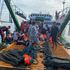 Passengers and crew forced to jump into water after Philippine ferry fire kills seven