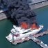 Firefighters tackle huge blaze on superyacht in marina