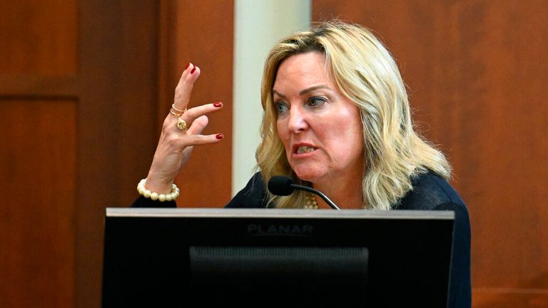 Dr Dawn Hughes, a clinical and forensic psychologist practicing in New York City, testifies during a hearing at the Fairfax County Circuit Courthouse in Fairfax, Virginia, on May 3, 2022. - US actor Johnny Depp sued his ex-wife Amber Heard for libel in Fairfax County Circuit Court after she wrote an op-ed piece in The Washington Post in 2018 referring to herself as a "public figure representing domestic abuse." (Photo by JIM WATSON / POOL / AFP)