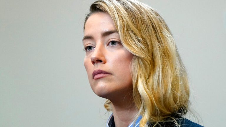 Actor Amber Heard returns to the courtroom after a break at Fairfax County Circuit Court during a defamation case against her by ex-husband, actor Johnny Depp, in Fairfax, Virginia, U.S., May 4, 2022. REUTERS/Elizabeth Frantz/Pool