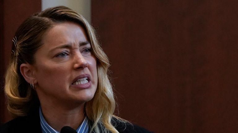 Actor Amber Heard testifies in the courtroom at the Fairfax County Circuit Court in Fairfax, Va., Wednesday May 4, 2022. Actor Johnny Depp sued his ex-wife Heard for libel in Fairfax County Circuit Court after she wrote an op-ed piece in The Washington Post in 2018 referring to herself as a &#34;public figure representing domestic abuse.&#34; (Elizabeth Frantz/Pool Photo via AP)