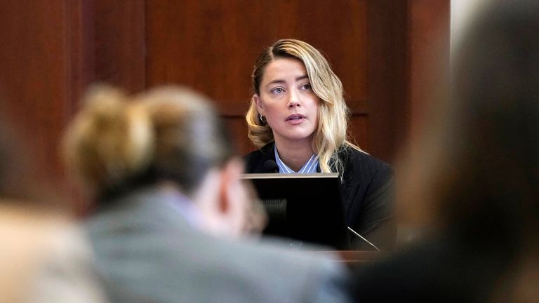 Actor Amber Heard testifies at Fairfax County Circuit Court during a defamation case against her by ex-husband, actor Johnny Depp in Fairfax, Virginia, U.S., May 4, 2022. REUTERS/Elizabeth Frantz/Pool