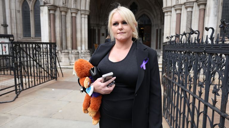 Archie Battersbee's mother, Hollie Dance, outside the High Court, central London.  Hospital bosses want the unconscious 12-year-old to be tested to see if he's brain dead - and have asked the Supreme Court judge for permission.  Archie hasn't woken up since being found with a leash over his head at home over a month ago.  Hollie thinks he might have been involved in a "online challenge".  Date taken: Thursday, May 12, 2022.