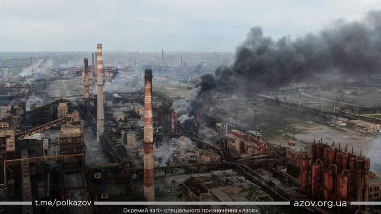 A view shows smoke rising at Azovstal Iron and Steel Works in Mariupol, Ukraine, in this handout picture obtained by Reuters on May 11, 2022. Azov Regiment/Handout via REUTERS    THIS IMAGE HAS BEEN SUPPLIED BY A THIRD PARTY. MANDATORY CREDIT
