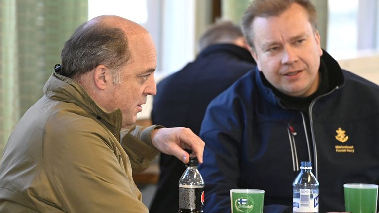 Finland&#39;s Minister of Defence Antti Kaikkonen and Britain&#39;s Defence Secretary Ben Wallace speak prior to a news conference of the Arrow 22 exercise at the Niinisalo garrison in Kankaanpaa, Finland