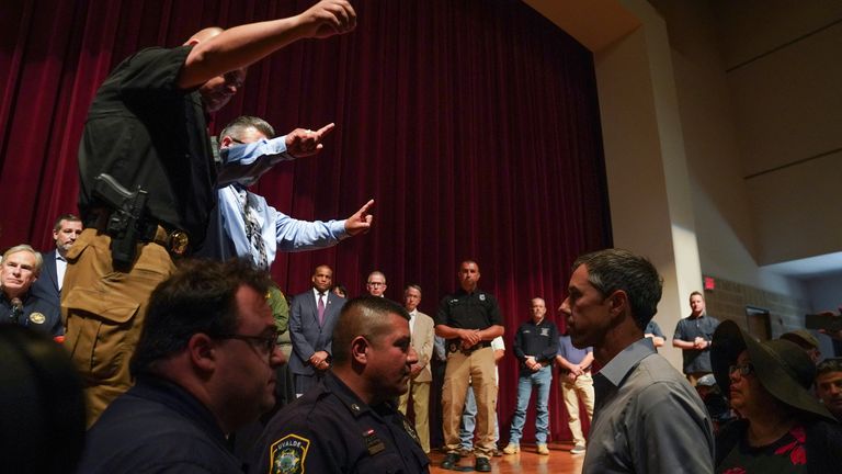 Texas Democratic gubernatorial candidate Beto O&#39;Rourke disrupts a press conference held by Governor Greg Abbott the day after a gunman killed 19 children and two teachers at Robb Elementary School in Uvalde, Texas, U.S. May 25, 2022. REUTERS/Veronica G. Cardenas