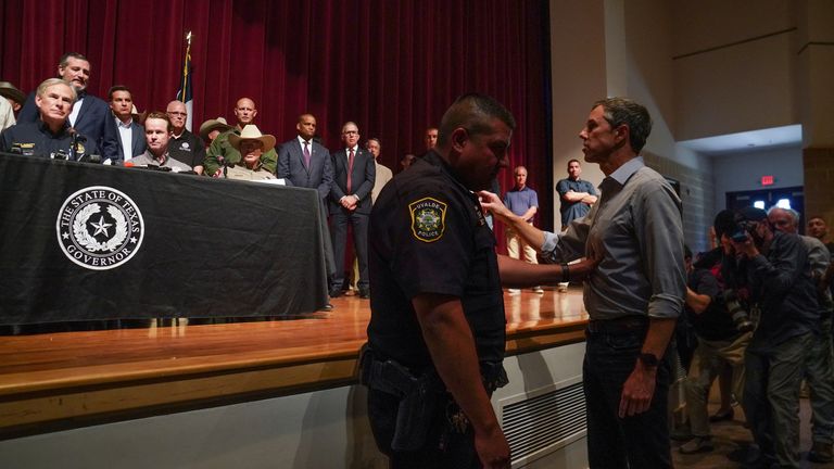 Texas Democratic gubernatorial candidate Beto O&#39;Rourke disrupts a press conference held by Governor Greg Abbott the day after a gunman killed 19 children and two teachers at Robb Elementary School in Uvalde, Texas, U.S. May 25, 2022. REUTERS/Veronica G. Cardenas