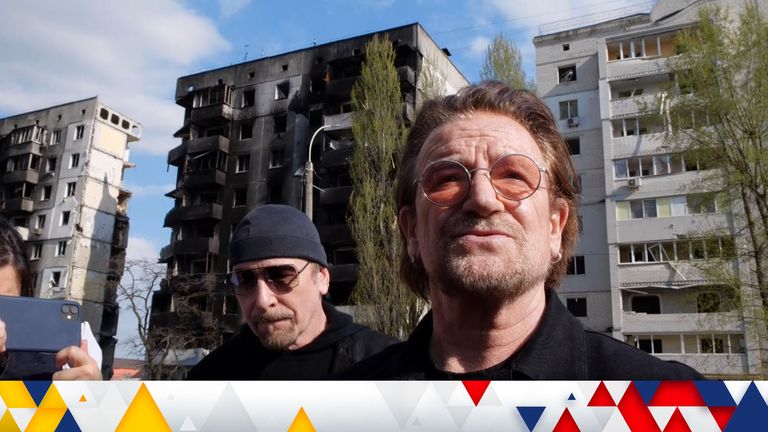 U2&#39;s Bono speaks to Sky News&#39;s Mark Austin in Borodyanka, while bandmate The Edge looks on