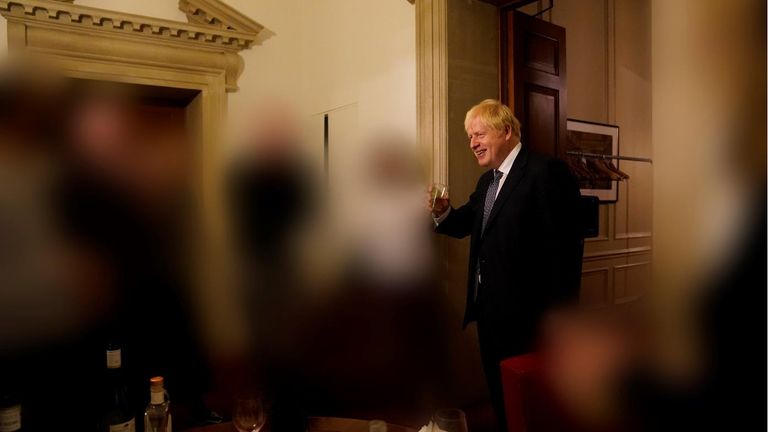 EDITORS NOTE IMAGE REDACTED AT SOURCE Handout photo dated 13/11/20 issued by the Cabinet Office showing Prime Minister Boris Johnson at a gathering in 10 Downing Street for the departure of a special adviser, which has been released with the publication of Sue's Gray report into Downing Street parties in Whitehall during the coronavirus lockdown. Issue date: Wednesday May 25, 2022.
