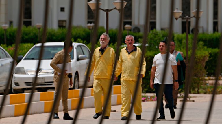 Jim Fitton and Volker Waldmann outside the court room in Baghdad, Iraq. Pic: AP