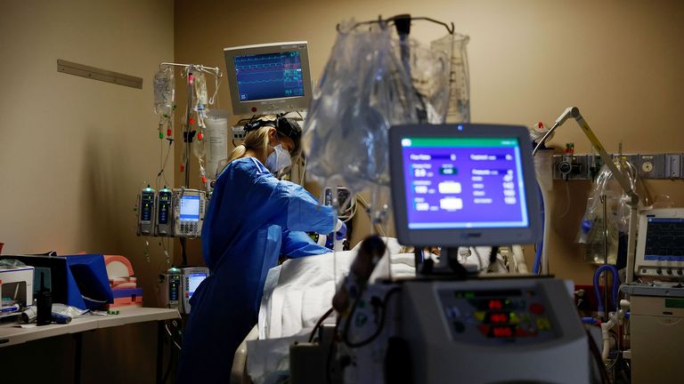 Medical staff treat a coronavirus disease (COVID-19) patient in the Intensive Care Unit (ICU) at the Providence Mission Hospital in Mission Viejo, California, U.S., January 25, 2022.  REUTERS/Shannon Stapleton.