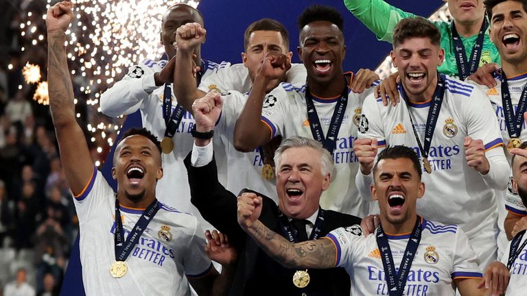 Real Madrid&#39;s Ferland Mendy, Eden Hazard, Vinicius Junior, Federico Valverde, Marco Asensio, Eder Militao, coach Carlo Ancelotti and Dani Ceballos celebrate after winning the Champions League REUTERS/Lee Smith