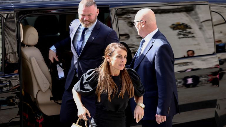 Coleen Rooney and her husband, Derby County manager Wayne Rooney, arrive at the Royal Courts of Justice in London, Britain, May 12, 2022. REUTERS/Henry Nicholls
