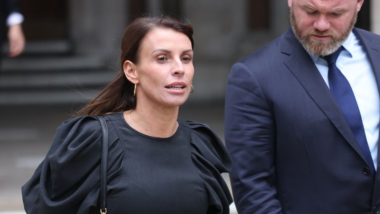 Coleen Rooney and husband Wayne leave the High Court