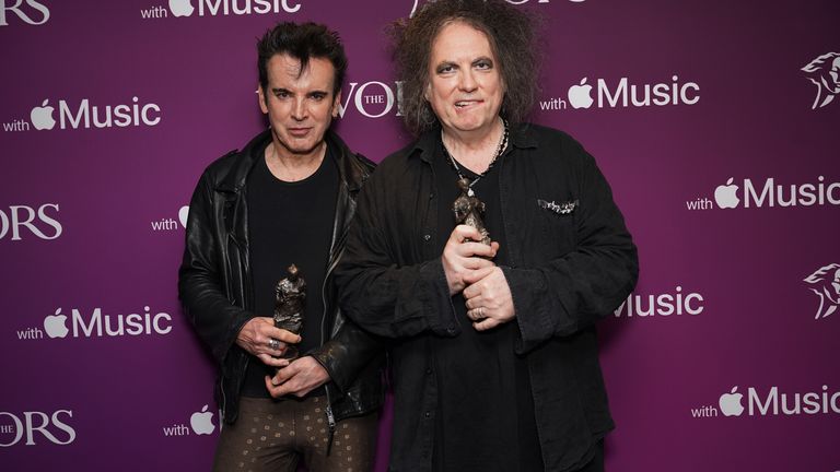 Robert Smith (right) and Simon Gallup of The Cure, who won the PRS for Music Icon award