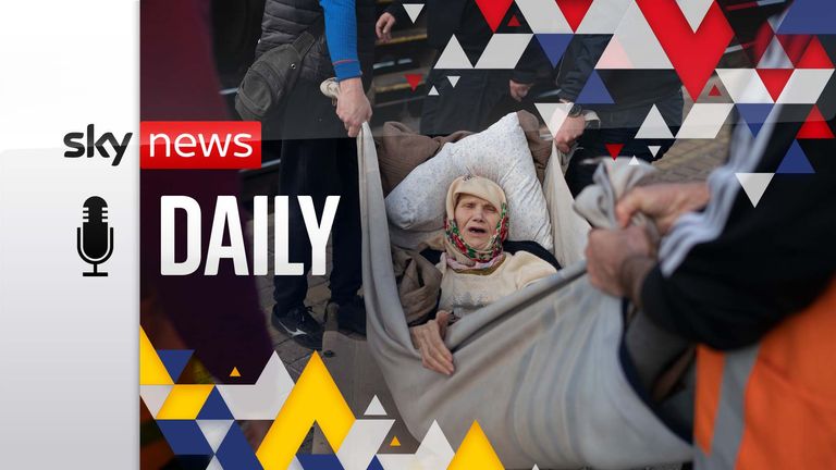 Klavidia, 91, is carried on an improvised stretcher as she boards a train, fleeing the fighting in Severodonetsk at a train station in Pokrovsk, Ukraine, Monday, April 25, 2022. (AP Photo/Leo Correa)