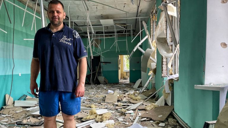 Dimetri Yesypenko, an adviser to the local mayor, stands in the wreckage of Soledar&#39;s administrative building