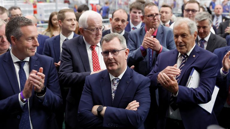 Democratic Unionist Party&#39;s (DUP) leader Sir Jeffrey Donaldson is applauded following his election for the Lagan Valley constituency during the Northern Ireland Assembly elections at the Ulster University Jordanstown count centre in Newtownabbey, Northern Ireland May 6, 2022. REUTERS/Jason Cairnduff
