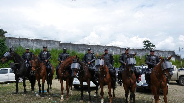 A helicopter overflies Bellavista prison where a deadly riot broke out overnight in Santo Domingo de los Tsachilas, Ecuador, Monday, May 9, 2022. (AP Photo/Dolores Ochoa)                      