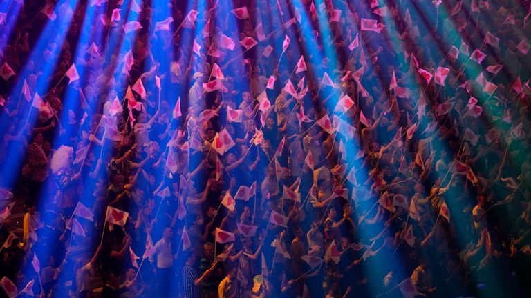 Spectators react during the Grand Final of the Eurovision Song Contest in Turin