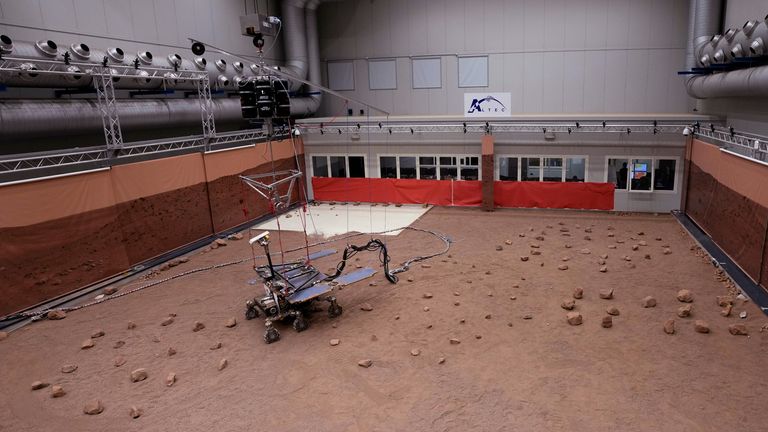 The prototype rover Amalia is tested in planet Mars simulated conditions inside the Altec&#39;s laboratory in Turin, Italy, Thursday, Feb. 17, 2022. Amalia is a copy of rover Rosalind Franklin that will explore Mars in the next Exomars mission that searches for signs of past and present life on the planet. The 2022 mission, launching on Sept. 20, includes a European rover, Rosalind Franklin, that will carry a drill and a suite of instruments dedicated to exobiology and geochemistry research, and a R