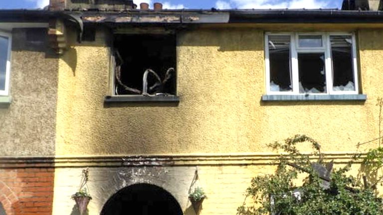 A home in New Malden, London, which suffered &#39;significant damage&#39; in a fire after a man burned timber on an open fire in his living room to heat his home