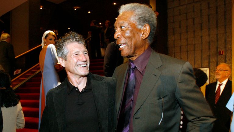 Ward pictured with Morgan Freeman at the premiere of 30 Minutes Or Less in 2011