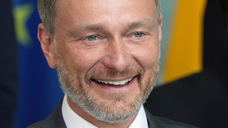 German Finance Minister Christian Lindner and various members of the cabinets of India and Germany wait for a family photo as part of a meeting at the chancellery in Berlin, Germany, Monday, May 2, 2022. (AP Photo/Michael Sohn)