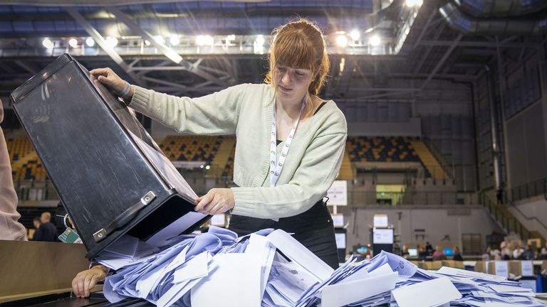 Ballot boxes are opened ready for sorting at the Glasgow City Council election count at the Emirates Arena, in Glasgow, in the local government elections. Picture date: Friday May 6, 2022.