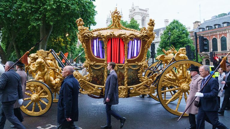 The gold state coach during an early morning rehearsal as service personnel from the Royal Navy, British Army, and Royal Air Force conduct a final early morning rehearsal through London ahead of Sunday&#39;s Platinum Jubilee Pageant, which will mark the finale of the Platinum Jubilee Weekend. Picture date: Tuesday May 31, 2022.
