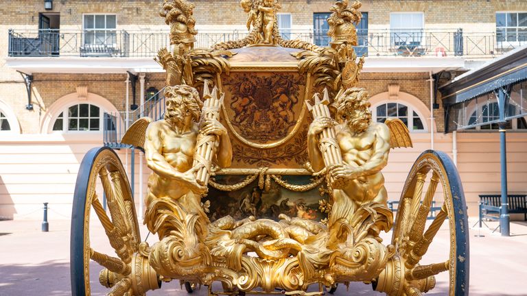 General view of the Gold State Coach, at the Royal Mews, Buckingham Palace, London.  The coach will be used as part of Queen's Platinum Jubilee celebrations.  Picture date: Friday May 6, 2022.