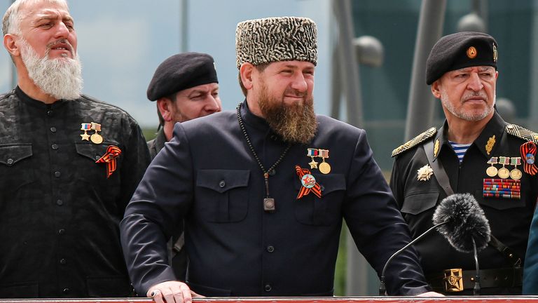 Chechen Republic leader Ramzan Kadyrov (С), Interior Minister Ruslan Alkhanov (R) and Russian State Duma member Adam Delimkhanov attend a military parade on Victory Day, which marks the 77th anniversary of the victory over Nazi Germany in World War Two, in the Chechen capital Grozny, Russia May 9, 2022. REUTERS/Chingis Kondarov