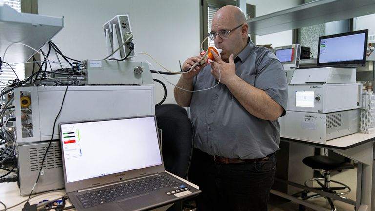 HOLD FOR STORY - Israeli Harel Hershtik, the vice president of strategy and technology at Scentech Medical, demonstrates his company...s product, which says it can detect certain diseases through a patient...s breath, at the company...s office in the city of Rehovet, Israel, Tuesday, May 3, 2022. When Hershtik was 20 years old, he planned and executed a murder. Today, he is the brains behind an Israeli health-tech startup, poised to make millions of dollars with the backing of prominent public figures and deep-pocketed investors. (AP Photo/Tsafrir Abayov)