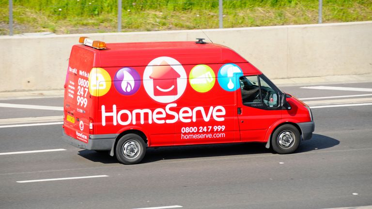 Homeserve red response van for domestic home emergency repair services cover from insurance driving along M25 motorway Essex England UK
