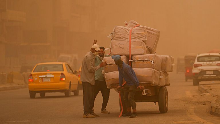 The latest sandstorm to sweep across the Middle East hit Baghdad on Monday. Pic: AP