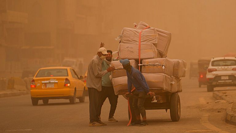 The latest sandstorm to sweep across the Middle East hit Baghdad on Monday.  Photo: AP