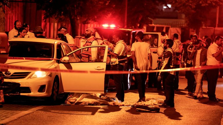 Israeli security and rescue personnel work at the scene after an incident in Elad, central Israel, May 5, 2022. REUTERS / Ammar Awad