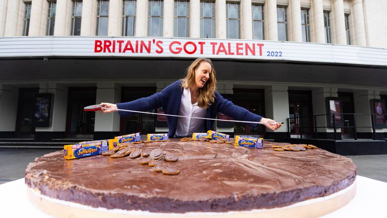Baker Frances Quinn at the unveiling of the Guinness World Record&#39;s &#39;largest Jaffa Cake&#39; outside the Eventim Apollo in London to celebrate McVitie&#39;s headline sponsorship of the 15th anniversary of Britain&#39;s Got Talent, London. Picture date: Monday May 30, 2022.
