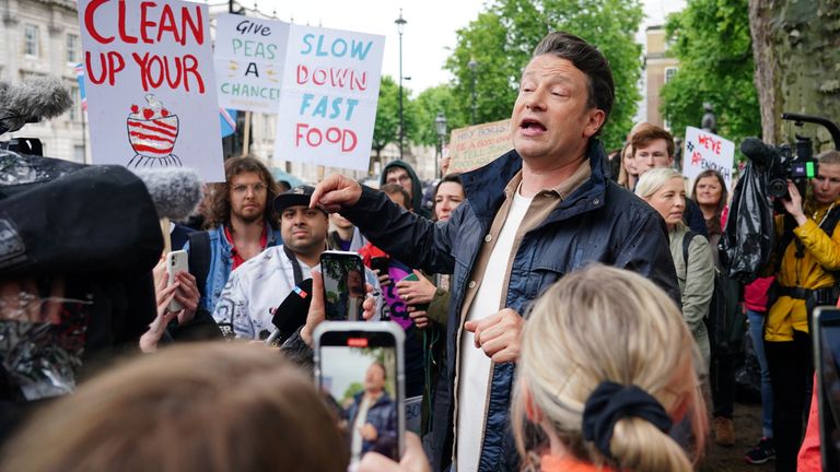 Chef Jamie Oliver takes part in the What An Eton Mess demonstration outside Downing Street, London, calling for Prime Minister Boris Johnson to reconsider his U-turn on the Government&#39;s anti-obesity strategy. Picture date: Friday May 20, 2022.

