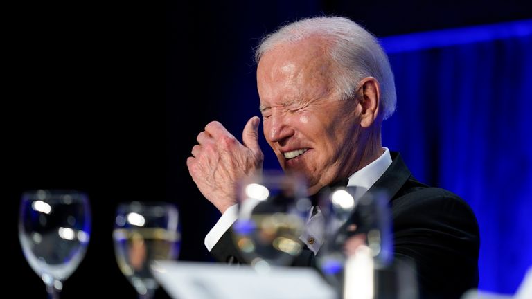 President Joe Biden laughs as he listens to Trevor Noah speak at the annual White House Correspondents&#39; Association dinner (AP Photo/Patrick Semansky)