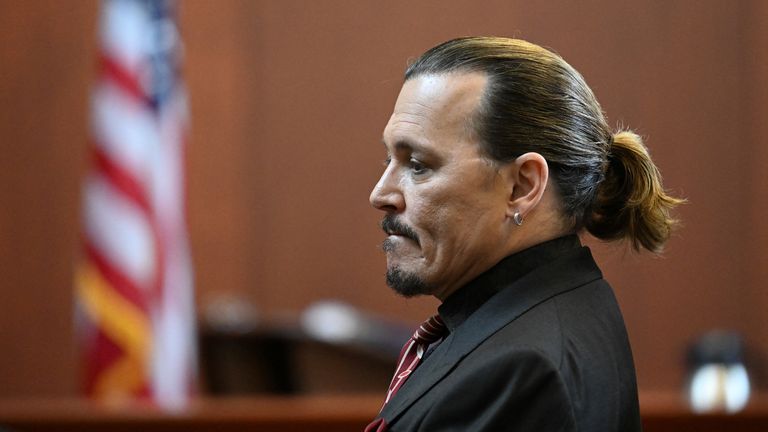 Actor Johnny Depp looks on in the courtroom at Fairfax County Circuit Court during his defamation case against ex-wife, actor Amber Heard, in Fairfax, Virginia, U.S., May 3, 2022. Jim Watson/Pool via REUTERS
