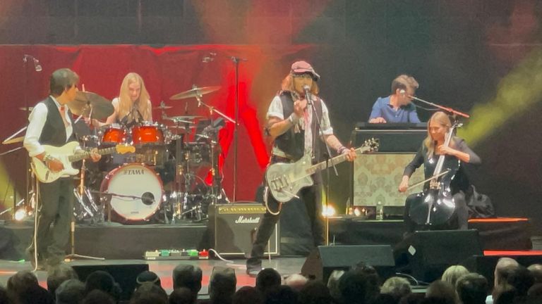 Actor Johnny Depp appears on stage at The Royal Albert Hall alongside Jeff Beck