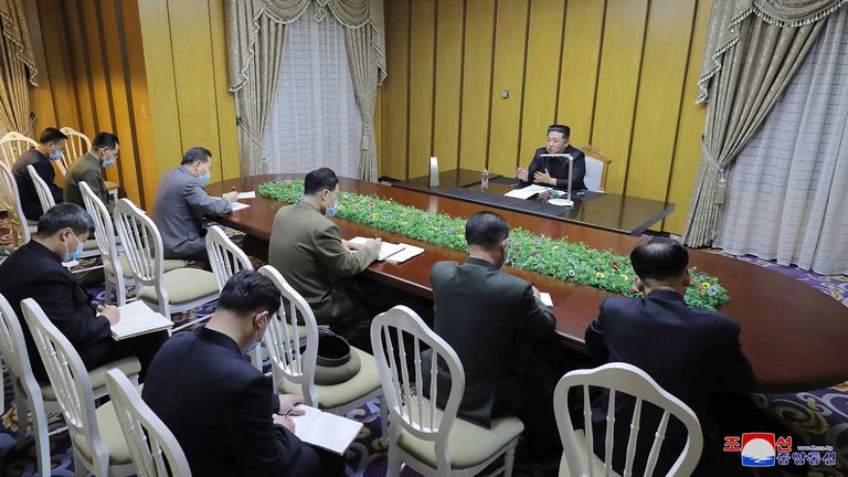 Kim Jong Un, visits state emergency epidemic prevention headquarters in North Korea. Pic: KNCA/AP