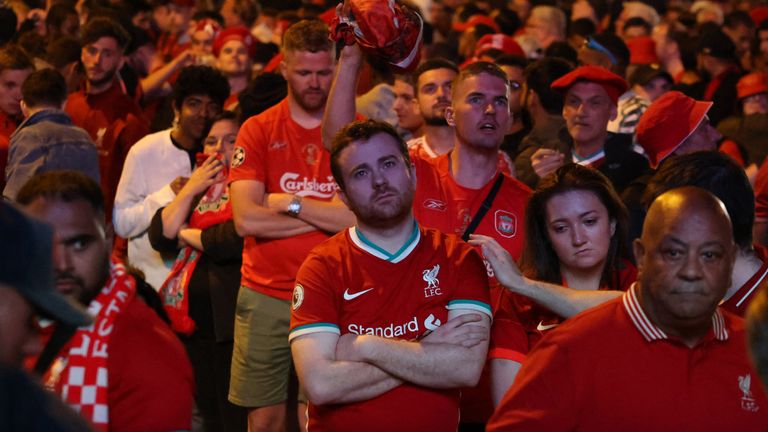 Liverpool fans look dejected as Real Madrid win the Champions League Final