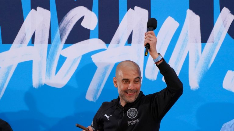 Manchester City&#39;s manager Pep Guardiola is cheered on stage