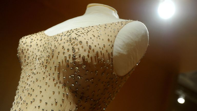 The dress originally cost $12,000 (£9,500) and the movie star had to be sewn into it Pic AP