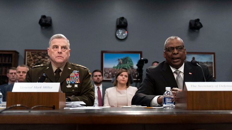 Secretary of Defense Lloyd Austin accompanied by Chairman of the Joint Chiefs of Staff Gen. Mark Milley testifies before House Committee on Appropriations-Subcommittee on Defense during a hearing for the Fiscal Year 2023 Department of Defense, on Capitol Hill in Washington, Wednesday, May 11, 2022. (AP Photo/Jose Luis Magana)